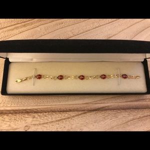 Lady bug bracelet. 10 kt gold